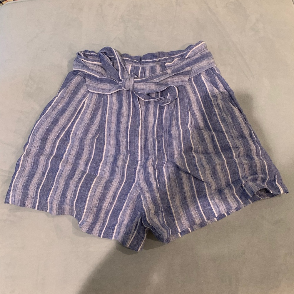 Blue cinch waist shorts.